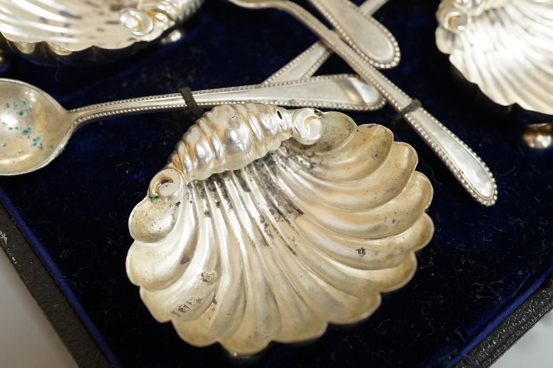 A group of small silver to include a cased modern silver butter shell and knife by Francis Howard Ltd, Sheffield, 1988, a cased set of four late Victorian silver shell salts with four associated plated spoons, a late 196